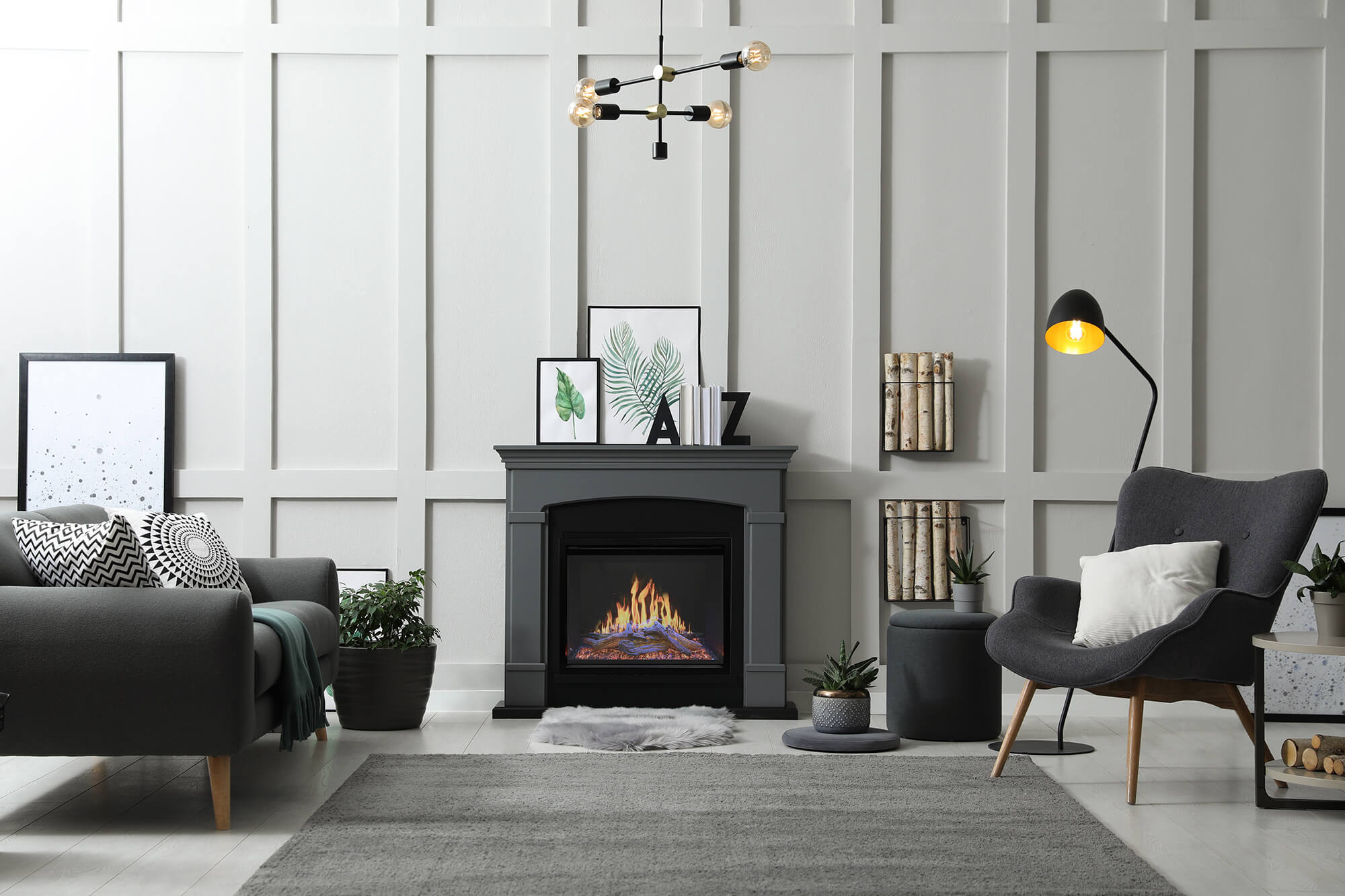Electric fireplace with a working flame effect built into a gray mantel in a family room